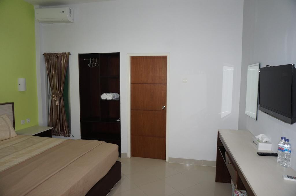Zaen Hotel Syariah Solo Rum bild
